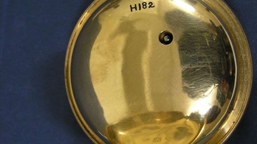 Antique gold pocket watch, white enamel dial
